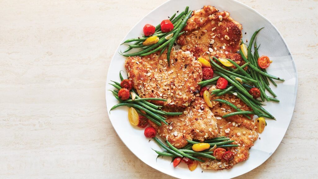 Escalope de poulet aux noisettes avec haricots verts à l'ail